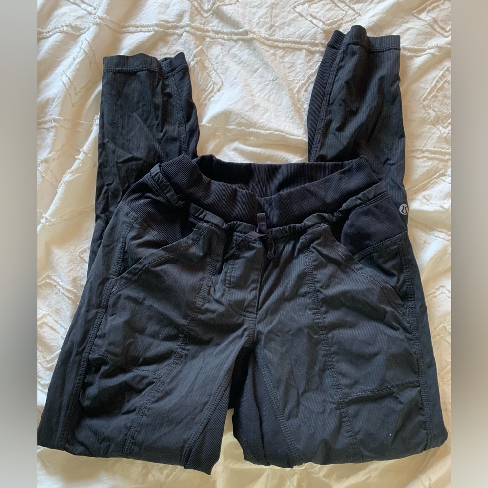 LULULEMON black track pants.